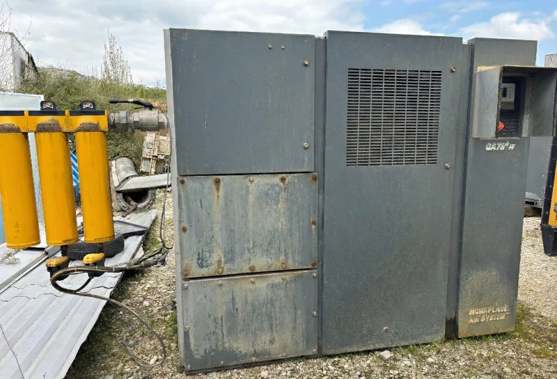 Compresseur Atlas Copco GA75+ d’occasion en vue latérale