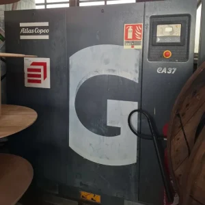 Compresseur Atlas Copco GA37 d’occasion sur skid avec cuve 1500 litres